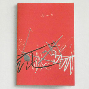 Copy of DANCEHALL 10, journal by Psykick Dancehall. A zine with a red cover, with an abstract drawing on it.